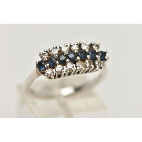 2 - AN 18CT WHITE GOLD DIAMOND AND SAPPHIRE RING, designed with a central row of circular cut blue sapph... 