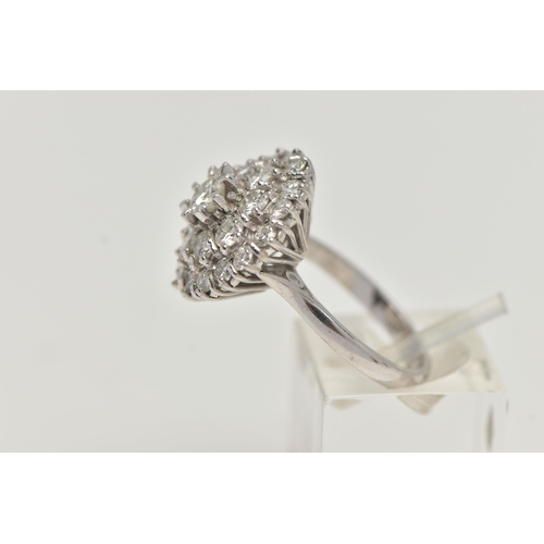 35 - A WHITE METAL DIAMOND CLUSTER DRESS RING, circular cluster of round brilliant cut diamonds, centre s... 