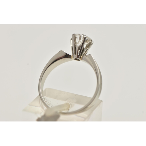 4 - A WHITE METAL SINGLE STONE DIAMOND RING, round brilliant cut diamond in a six claw setting, estimate... 