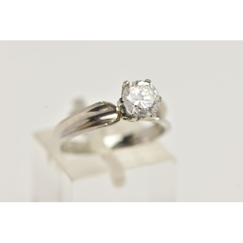 4 - A WHITE METAL SINGLE STONE DIAMOND RING, round brilliant cut diamond in a six claw setting, estimate... 