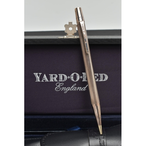 50 - A BOXED SILVER 'YARD-O-LED' PROPELLING PENCIL, engine turned pattern, personal engraving reads 'J.W'... 