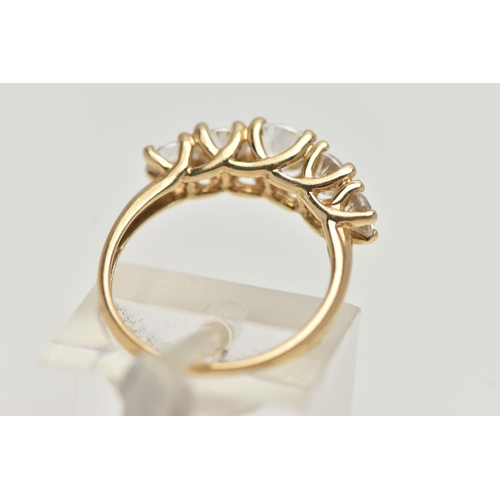 52 - A 14CT GOLD FIVE STONE RING, set with five graduated circular cut, cubic zirconia, claw set to a pol... 