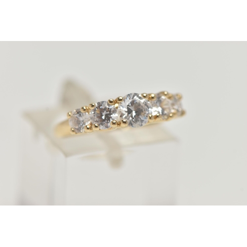 52 - A 14CT GOLD FIVE STONE RING, set with five graduated circular cut, cubic zirconia, claw set to a pol... 