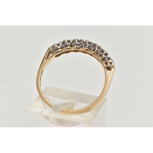 56 - A 15CT GOLD HALF ETERNITY RING, set with a row of circular cut, cubic zirconia, to a polished band, ... 