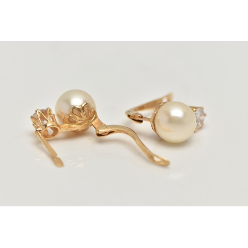 58 - A PAIR OF YELLOW METAL EARRINGS, each earring set with an imitation pearl and a circular cut cubic z... 