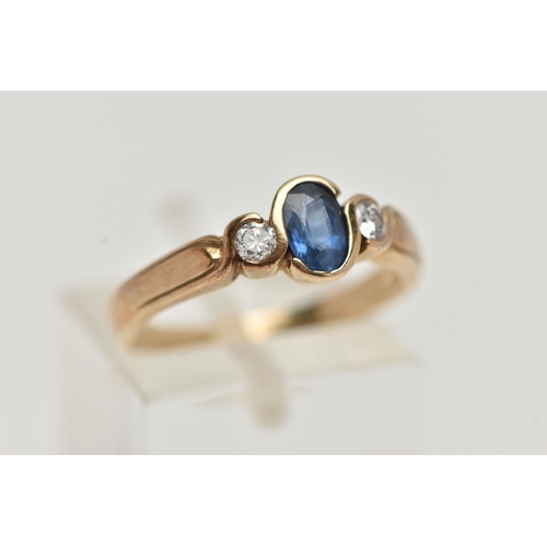 63 - A 9CT GOLD SAPPIRE AND DIAMOND RING, designed with a central oval cut blue sapphire, collet set, fla... 