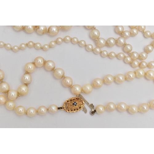 67 - THREE CULTURED PEARL NECKLACES, to include a single row of graduated cultured pearls, measuring appr... 