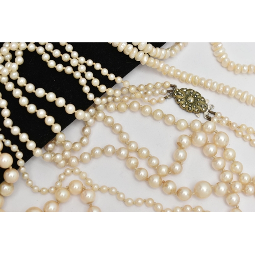 67 - THREE CULTURED PEARL NECKLACES, to include a single row of graduated cultured pearls, measuring appr... 