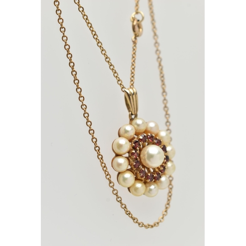 75 - A 9CT GOLD CULTURED PEARL AND GARNET CLUSTER NECKLACE, a principle cultured pearl, set with a surrou... 