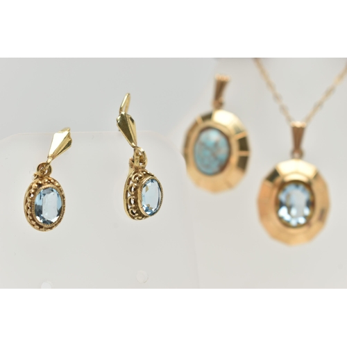 79 - TWO 9CT GOLD GEM SET PENDANTS AND A PAIR OF EARRINGS, the first pendant set with an oval cut topaz, ... 