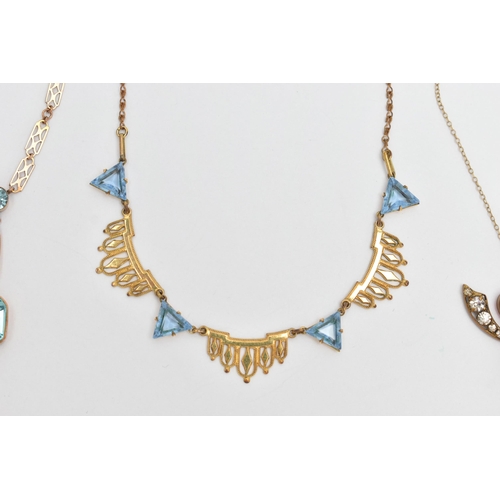 83 - FOUR EARLY 20TH CENTURY PASTE NECKLACES, the first a yellow metal art deco blue paste necklace, stam... 