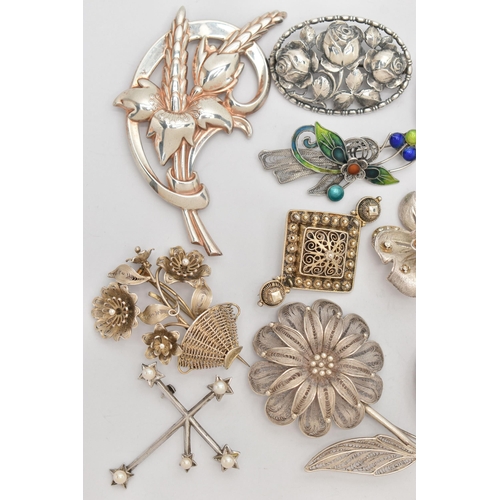 92 - AN ASSORTMENT OF WHITE METAL BROOCHES, eighteen brooches floral and foliage designed brooches, varyi... 