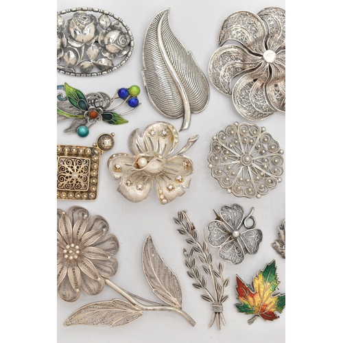 92 - AN ASSORTMENT OF WHITE METAL BROOCHES, eighteen brooches floral and foliage designed brooches, varyi... 