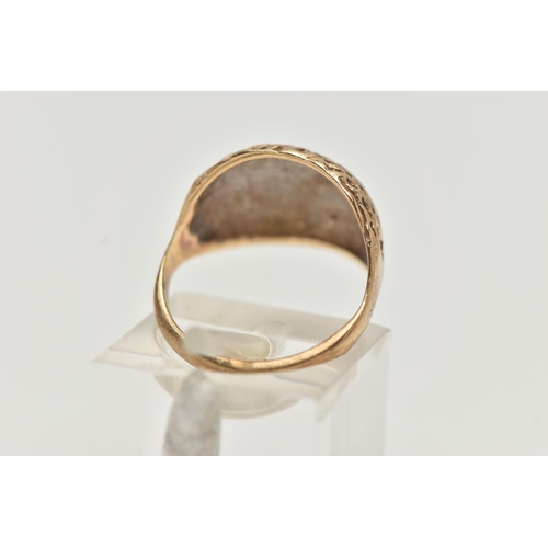 98 - A YELLOW METAL DOME RING, textured dome, to a polished band, unmarked, ring has been resized, ring s... 