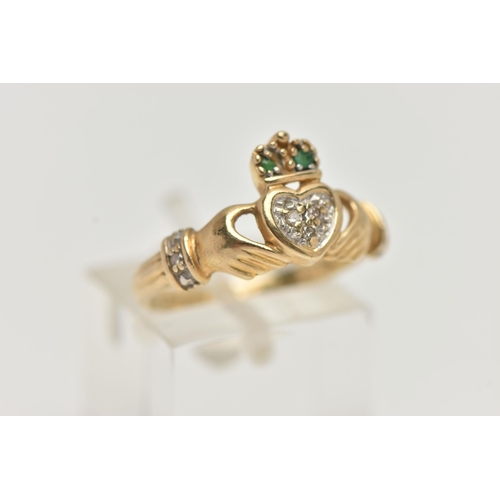 128 - A 9CT GOLD GEM SET CLADDAGH RING, the heart shape set with three brilliant cut diamonds, the crown s... 