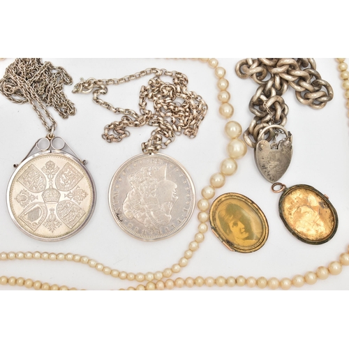 135 - A SELECTION OF JEWELLERY, to include two commemorative coin pendants, two imitation pearl necklaces,... 