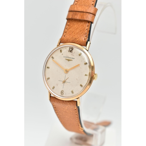 137 - A LONGINES WRISTWATCH, the circular face with cream coloured dial, baton and Arabic markers, subsidi... 