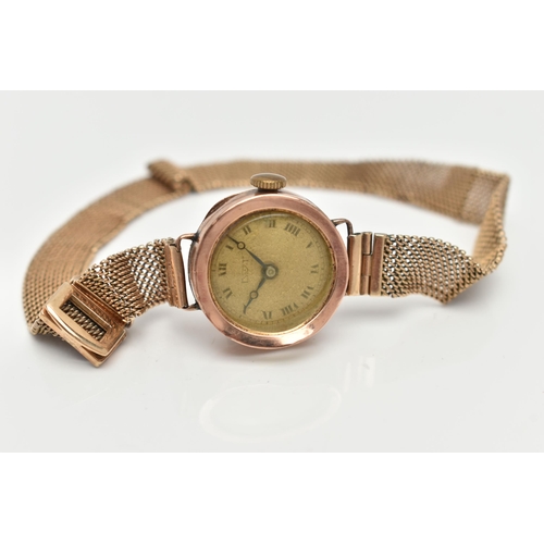 151 - A 9CT GOLD WRISTWATCH, hand wound movement, round dial, Roman numerals, rose gold case, approximate ... 