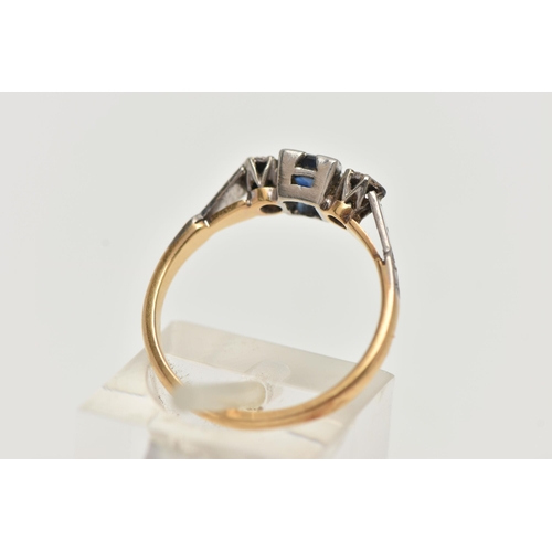 156 - A YELLOW METAL SAPPHIRE AND DIAMOND RING, set with a central square cut blue sapphire, flanked with ... 