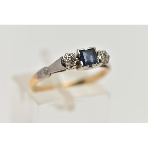 156 - A YELLOW METAL SAPPHIRE AND DIAMOND RING, set with a central square cut blue sapphire, flanked with ... 