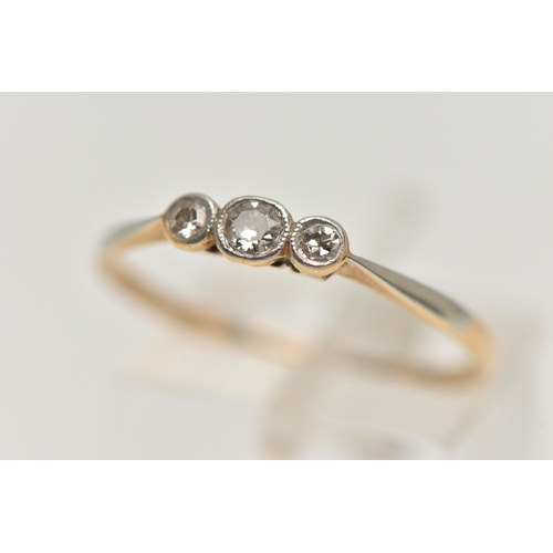 159 - TWO THREE STONE DIAMOND RINGS, the first an old cut diamond and two single stone diamonds, bezel set... 