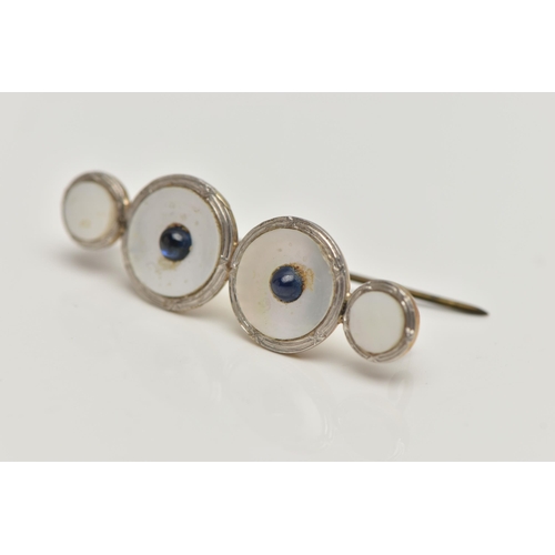 163 - A CONVERSION BROOCH, four mother of pearl white and yellow metal dress studs fitted together, fitted... 