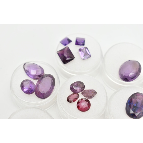 204 - A BOX OF CUT GEMSTONES, various cut amethyst in protective capsules, to include oval, circular, pear... 