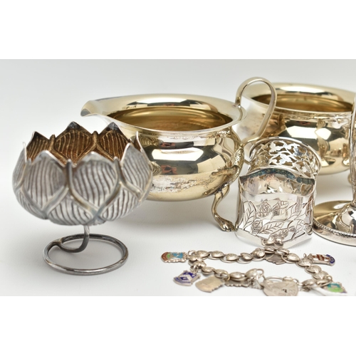 213 - AN ASSORTMENT OF ITEMS, to include a silver napkin ring,  hallmarked 'John Thompson & Sons' Birmingh... 