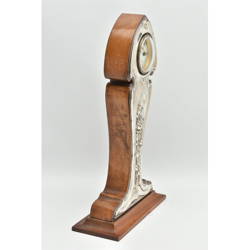 223 - A GEORGE V ART NOUVEAU SILVER MOUNTED WALNUT MANTEL CLOCK, the repoussé front with sinuous scrolls a... 