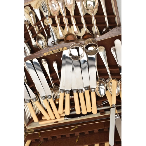 236 - A WOODEN CANTEEN, stainless steel cutlery for a twelve person table setting, knives fitted with ivor... 