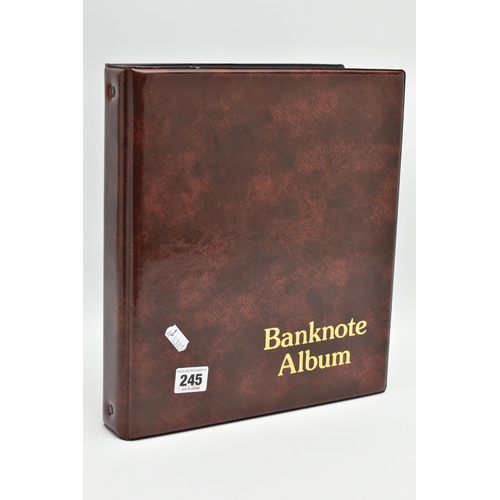 245 - A BANKNOTE ALBUM CONTAINING, United Kingdom and Ireland from 1914 onward to include Bradbury 10/- pr... 