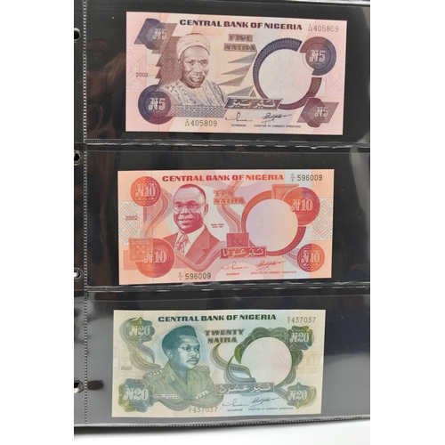 246 - TWO WORLD BANKNOTE ALBUMS CONTAINING USED AND UNCIRCULATED NOTES, to include 6x Checkslovakia  Speci... 