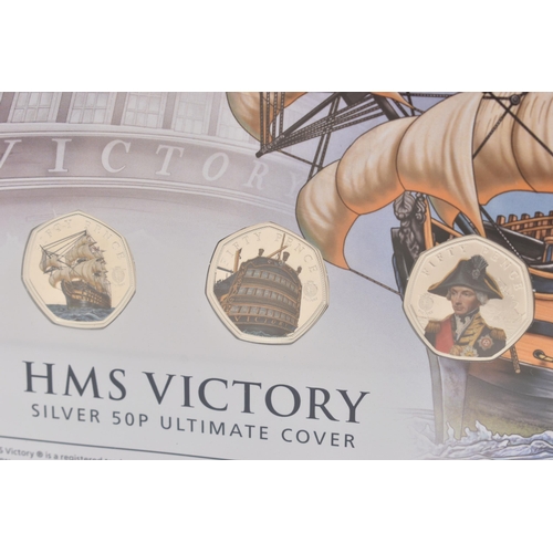 252 - HMS VICTORY SILVER 50P ULTIMATE COVER, contains five fifty pence coins, with certificate of authenti... 