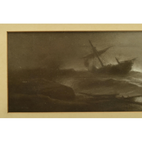 305 - AN EARLY 20TH CENTURY COASTAL SHIPWRECK SCENE, depicting a ship foundering in stormy seas at night, ... 