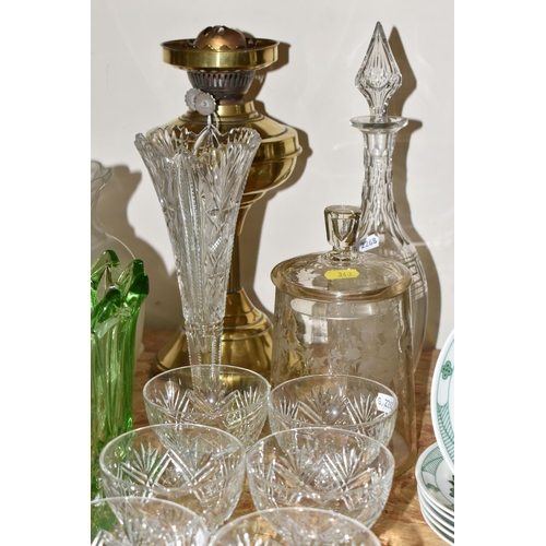 343 - A GROUP OF EARLY 20TH CENTURY GLASSWARE, comprising three apothecary jars, two measuring jugs, a blu... 