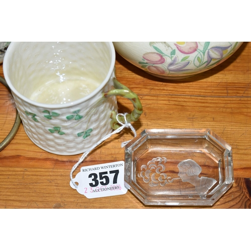 357 - A GROUP OF CERAMICS AND GLASSWARE, comprising a Belleek cup with a woven relief design and Shamrock ... 