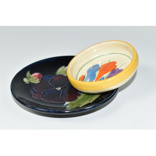 365 - A MOORCROFT POTTERY 'PANSY' PATTERN PIN DISH, diameter 11.5cm impressed marks and paper Queen Mary l... 