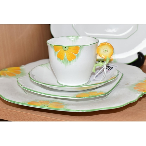 370 - AN ART DECO AYNSLEY TRIO AND TWO CAKE PLATES, pattern number 5102, 'Butter Cup' Art Deco design with... 