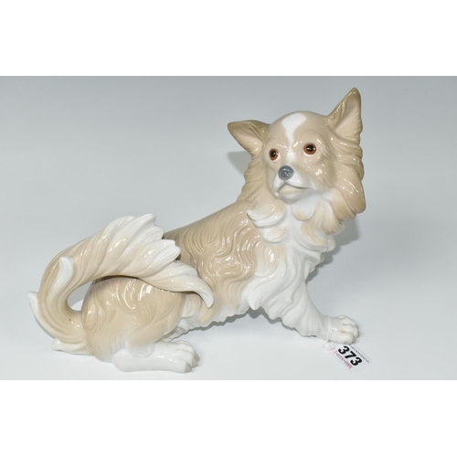 373 - A LLADRO 'PAPILLON' DOG FIGURINE, 4857 by Alfredo Ruiz, issued 1974-1979, height 20cmx length 28cm (... 