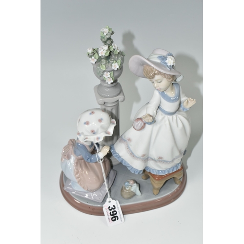 396 - A LLADRO FIGURE GROUP 'A STITCH IN TIME', model no 5344, sculpted by Regino Torrijos, issued 1986-19... 