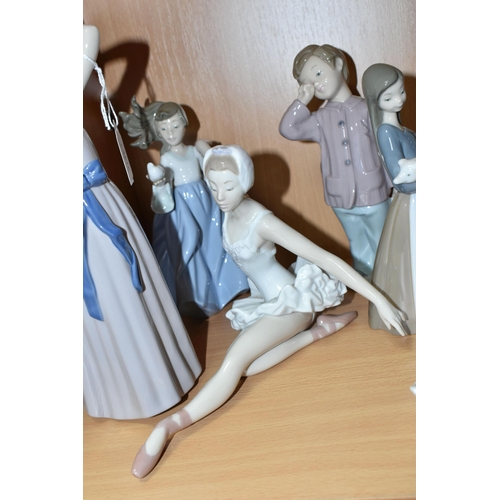 405 - A GROUP OF LLADRO AND NAO FIGURES, comprising Lladro: Trying on a Straw Hat, model no 5011, sculptor... 