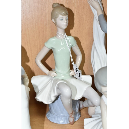 411 - A LLADRO FIGURE AND NINE NAO FIGURES, comprising Lladro 'Laura' seated ballerina figure, model no 13... 