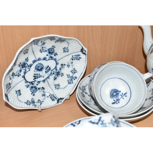 433 - A MEISSEN BLUE ONION PATTERN PART TEA SET, comprising a teapot, five tea cups, six saucers (two chip... 