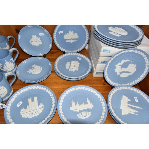 441 - A LARGE QUANTITY OF CHRISTMAS WEDGWOOD BLUE JASPERWARE TANKARDS AND PLATES, comprising fifteen Chris... 