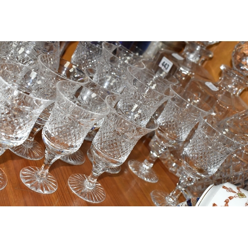 443 - A GROUP OF CUT GLASSWARE, comprising a set of six cobalt blue wine glasses with clear twisted glass ... 