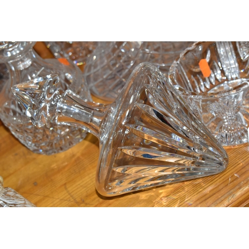 445 - A GROUP OF CUT CRYSTAL DECANTERS, comprising a Waterford Crystal dish, a Stuart Crystal tilting deca... 