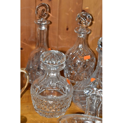 445 - A GROUP OF CUT CRYSTAL DECANTERS, comprising a Waterford Crystal dish, a Stuart Crystal tilting deca... 