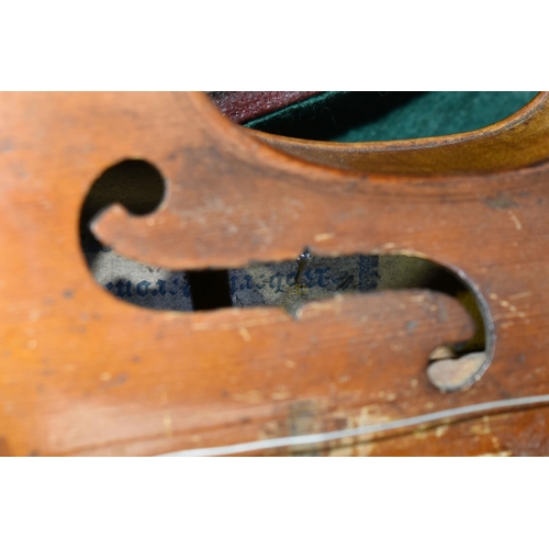 458 - TWO CASED VIOLINS, in need of some attention, one bearing paper label reading 'Robert Weron, 1855', ... 