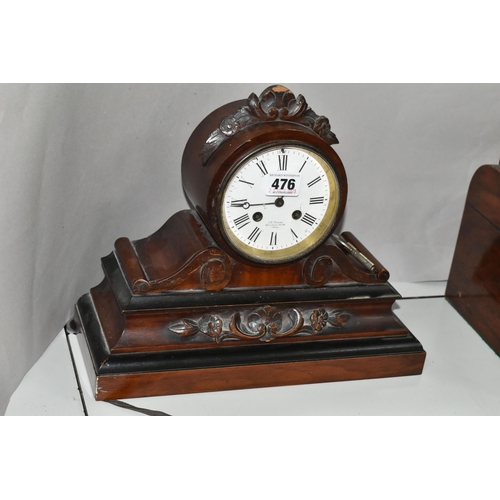 476 - A VICTORIAN ROSEWOOD AND EBONISED CASED MANTEL CLOCK, the drum shaped clock case with foliate surmou... 