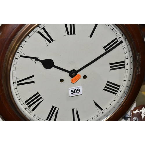 509 - A MAHOGANY CASED CHIMING WALL CLOCK, having a painted dial with roman numeral hour markers, approxim... 